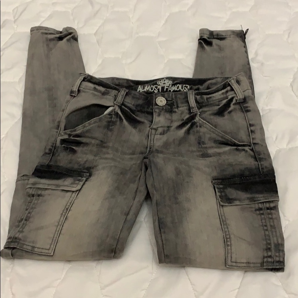 Gray and black skinny jeans